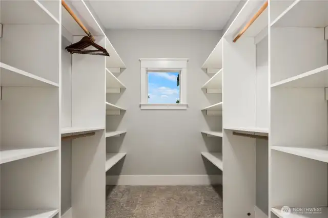 One of two large walk in closets with ample storage space.