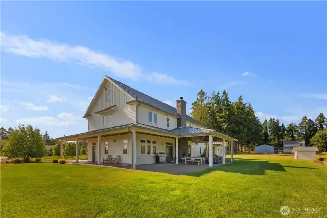 Views of the south side of the home showcasing the covered back patio and porch off the pantry.