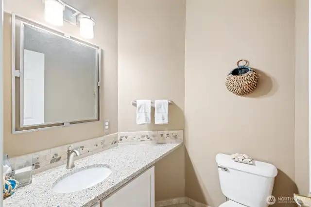 Half bath on the main floor, in the hall. Private and lovely.