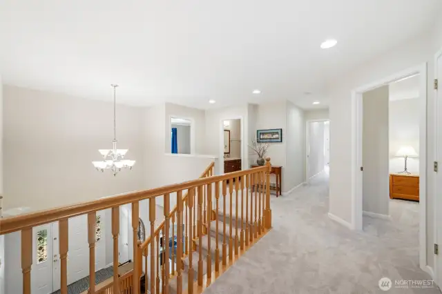 Balcony overlooking the entry, 3rd bedroom and full bath to the left, the 4th bedroom and study on the right, and 2nd primary bedroom down the hall. Really a deluxe home.