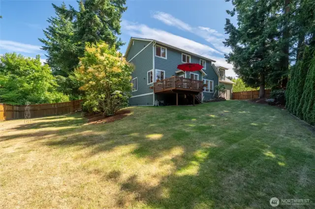 Back yard is large and private, Deck is very lovely overlooking the privacy.