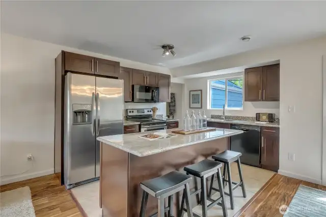 Super functional kitchen with room for everything. With so much counterspace, you could have a coffee or tea station where the antique radio sits now. And of course....a dishwasher!
