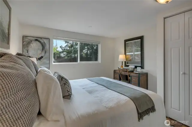 Bedroom #1: Tucked into the rear of the home for privacy, it overlooks the backyard and has a desk or large dresser nook.