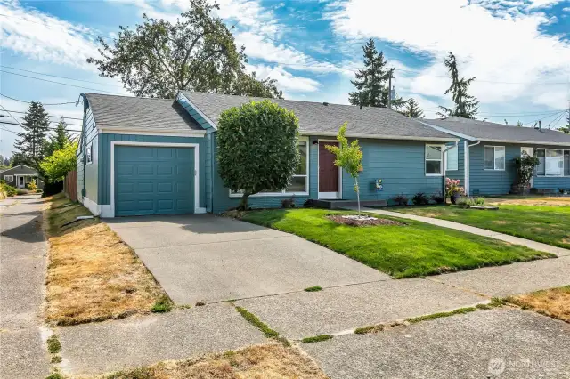 One car garage, off street parking. Quiet alley to the north gives the home some elbow room. Possible future drive-in or gate access to the rear yard. Buyer to verify.