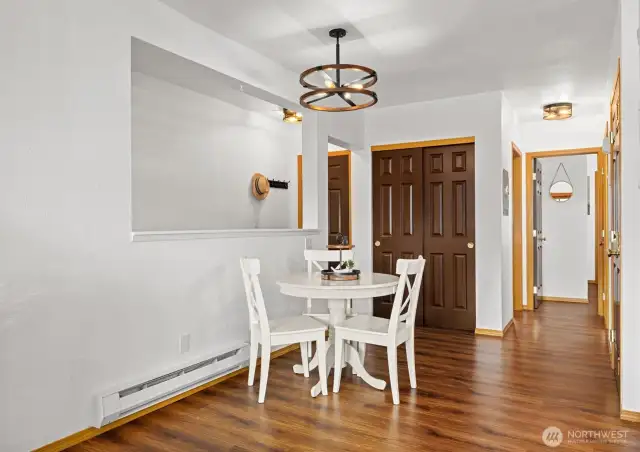 Dining area with great new light fixture.