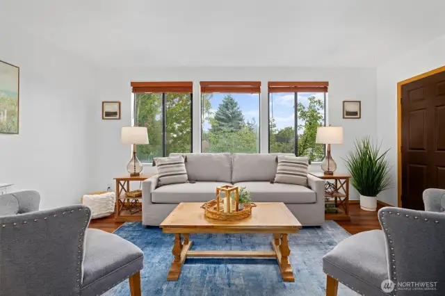 Large windows flood the space with natural light & show off territorial views.