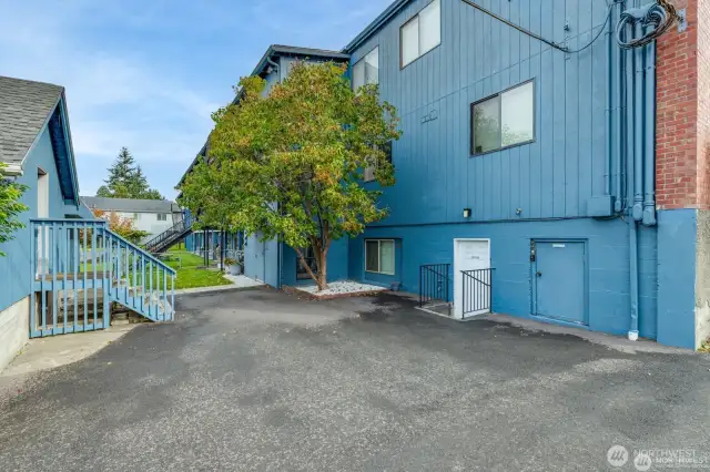 White door leads to storage unit.