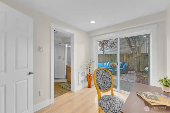 main floor bedroom and 3/4 bath with access to the private patio