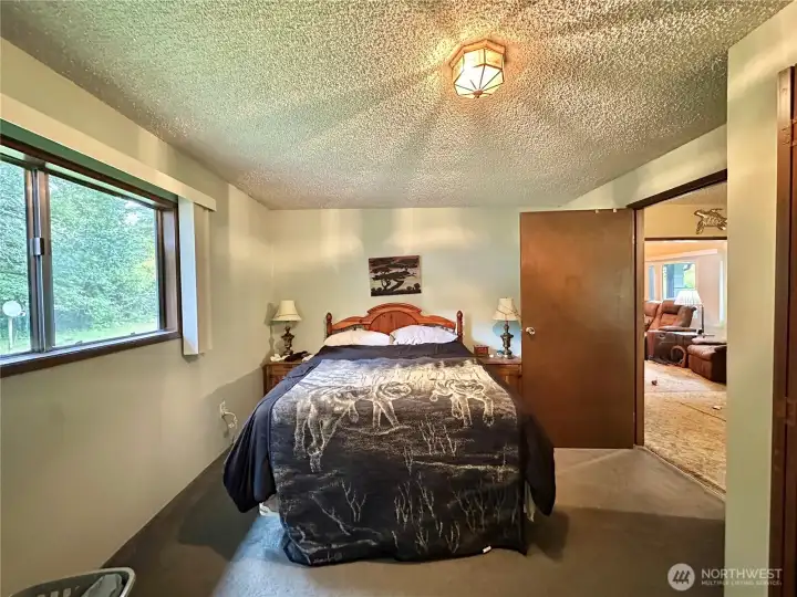 3rd Bedroom Has Slider to covered area where the hot tub is !