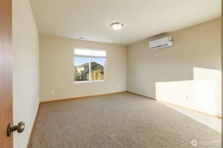Upper-level guest bedroom