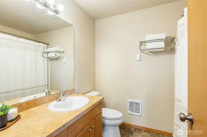 Upper-level full guest bathroom