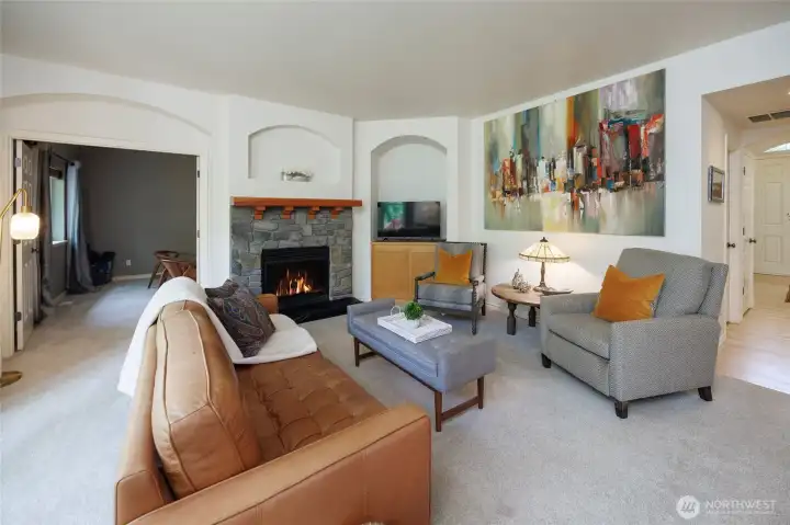 Family room includes an adjacent Main floor office or 5th Bedroom. The 3/4 bathroom is also adjacent to this room.