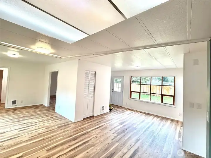 Dining and living areas.  Additional pantry