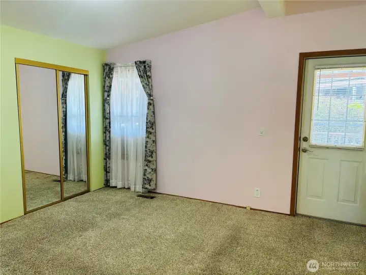 Primary bedroom with 2 full closets