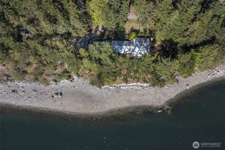 Aerial of property at low tide.