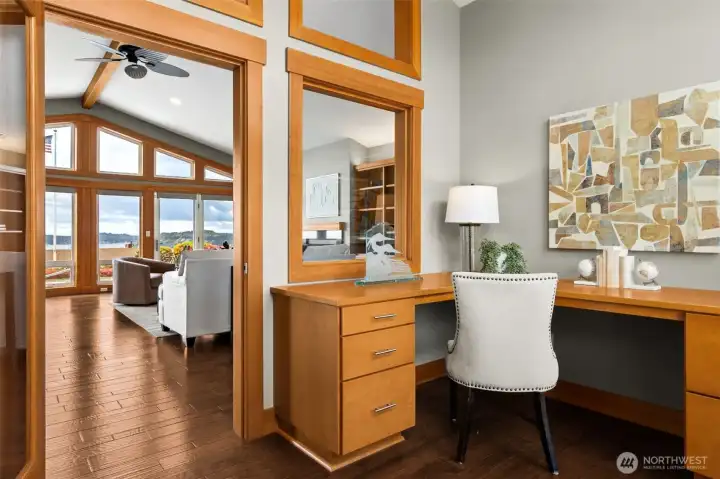 Designated office off livinng area with views out to courtyard and of Sound through living room