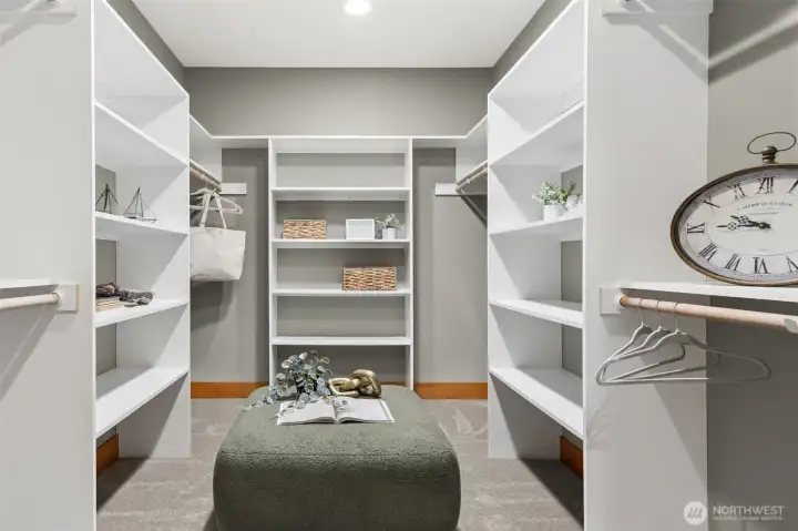 Custom closet has additional "dressing" area