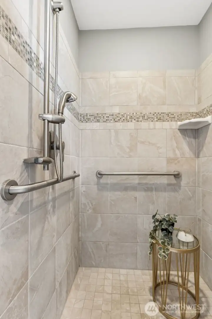Walk-in shower with beautiful tile surround