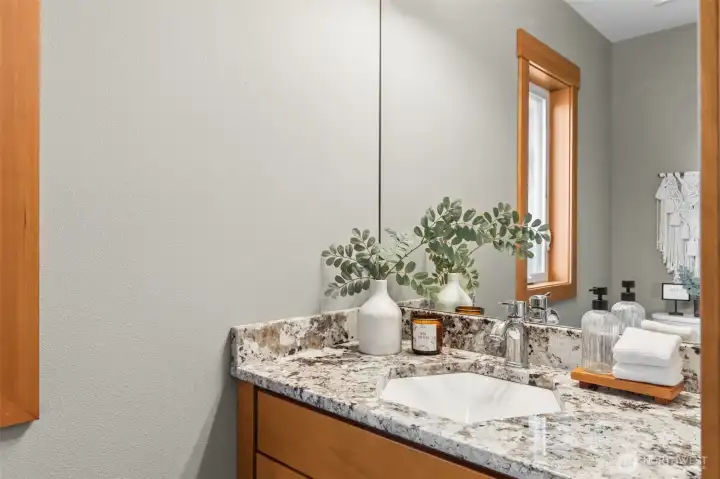 Half bathroom with unique hexigon sink