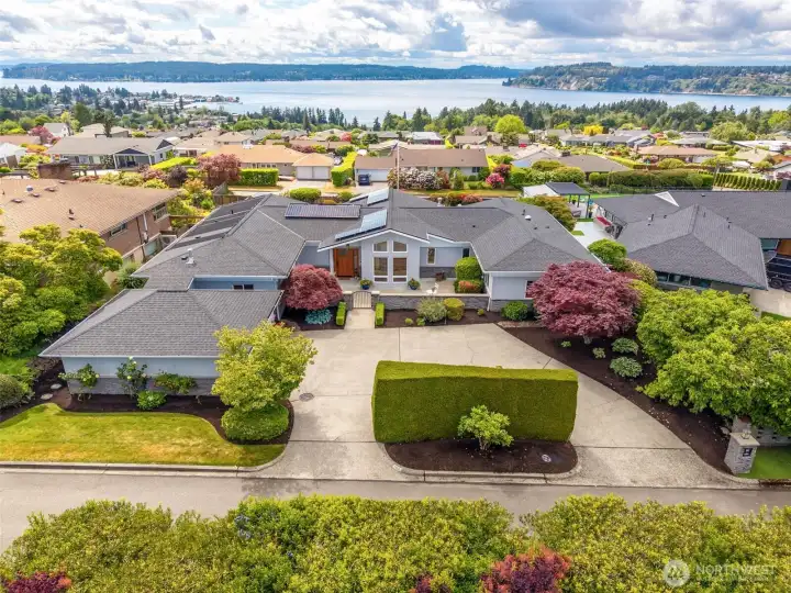Lot of parking with 2 car attached garage and circular driveway