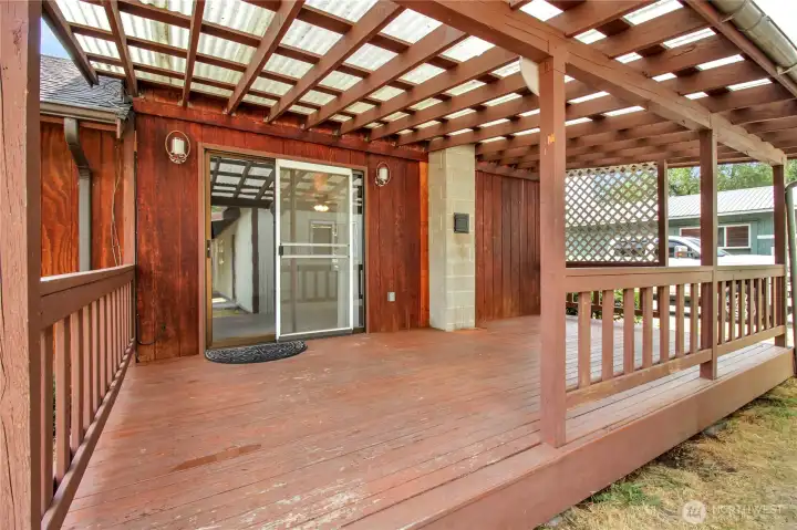 Back covered deck! Spacious and could easily be netted for outdoor living space.