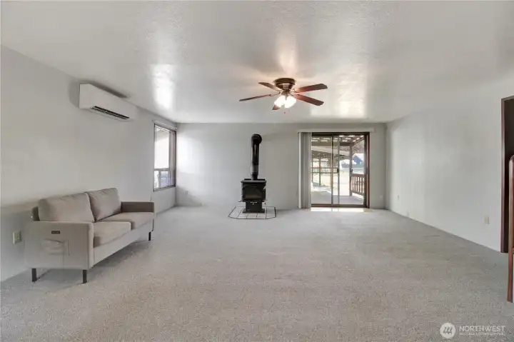 Living room with slider that enters onto the covered back porch.