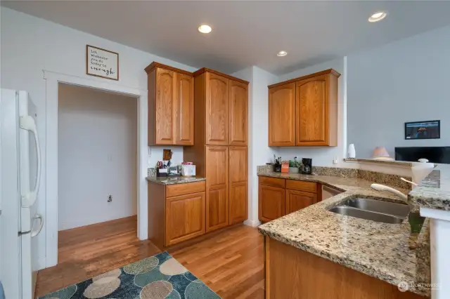 The kitchen is spacious with ample cabinetry