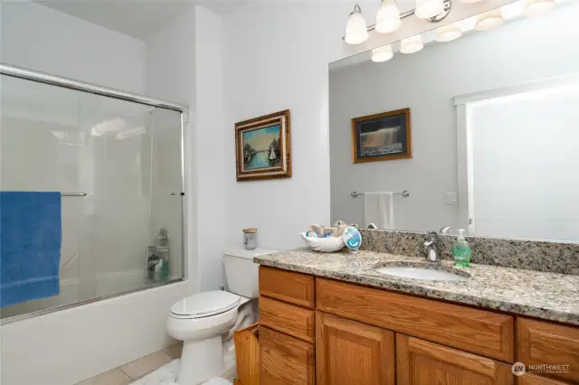 The main bathroom with a full tub/shower.