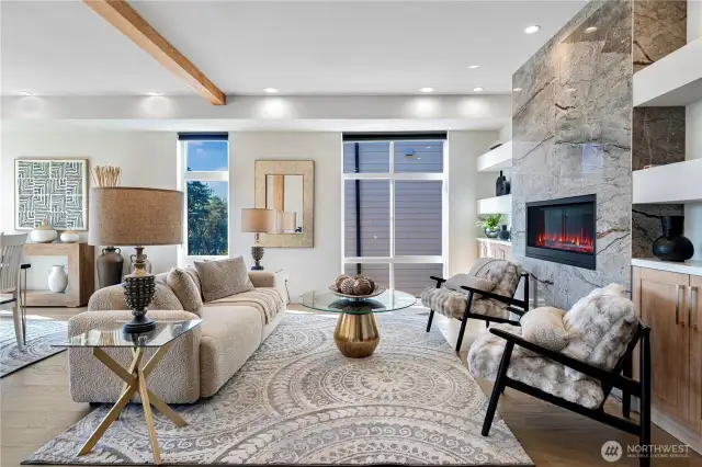 The linear gas fireplace offers cozy warmth during the rainy season—perfect for Seattle living!