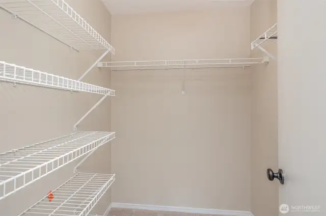 Primary bedroom boasts a walk-in closet.