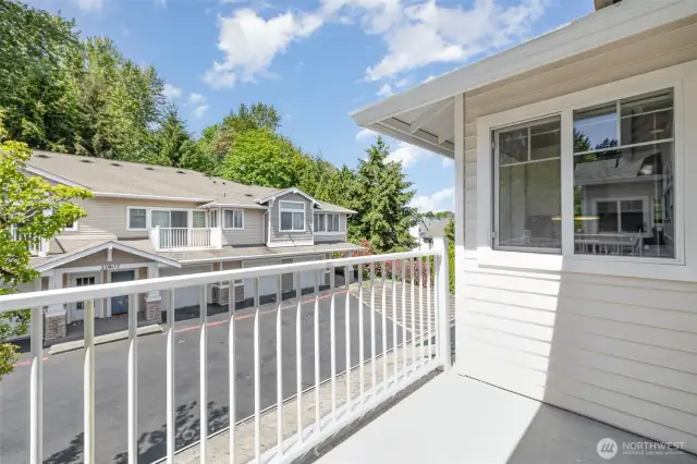 Step onto the private deck, offering a seamless indoor-outdoor living experience.
