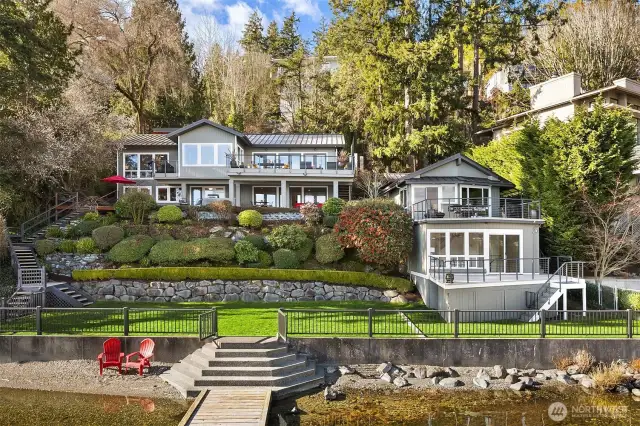 Gorgeous main house and beach cottage with 100' of waterfront, massive flat lawn and sandy beach.  Badminton anyone??