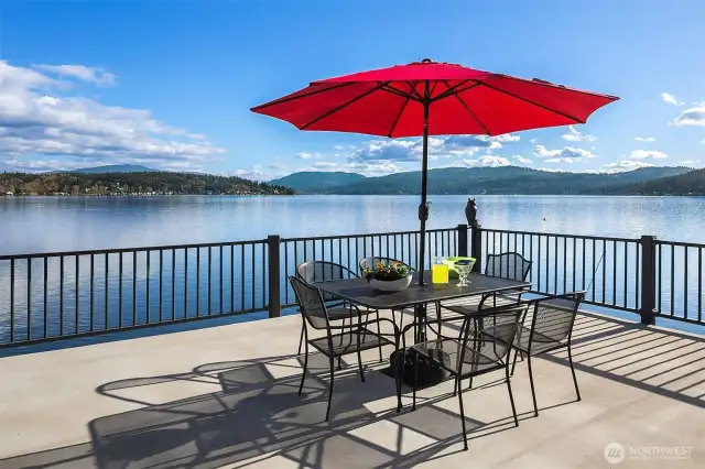 The epitome of lake living on Lake Sammamish!  Rare anc coveted double decker dock with a huge deck for entertaining al fresco, panoramic lake and mountain views.  Feeling sporty?  Do a swan dive or cannonball off the upper dock deck into the crystal waters below!