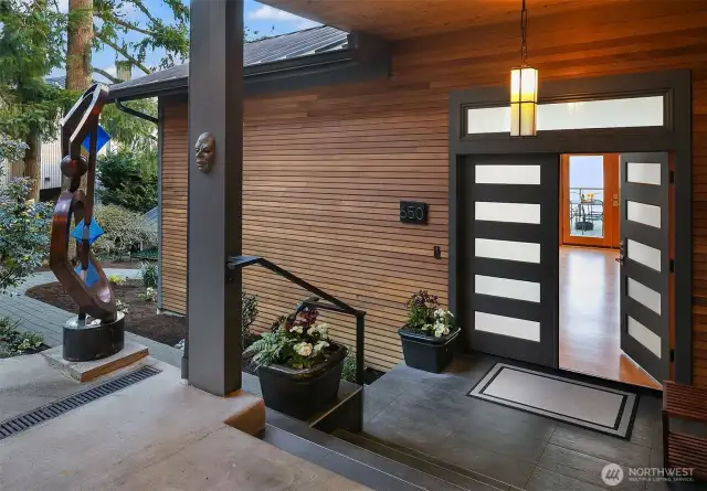 Totally undated mid century modern home with architectural   "wow" factors throughout.