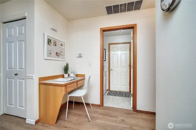 A convenient half bath desk/nook and laundry room with storage enhance the functionality of the main floor.