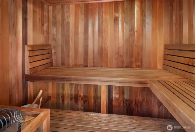 Unwind in the home's private sauna, a luxurious bonus feature offering relaxation and wellness at your convenience. Whether post-workout or just to recharge, this retreat adds a spa-like feel to everyday living.