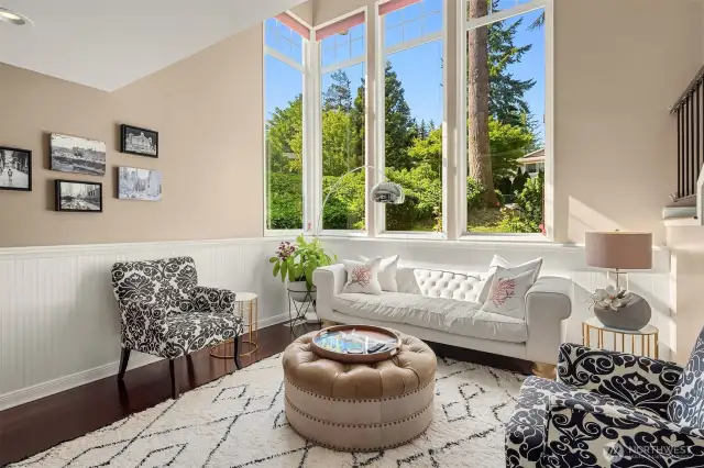 The daylight basement-level family room offers a quiet retreat for movie nights or gaming. Its open space, natural light, and nearby ¾ bath make it versatile enough to double as a guest suite or creative studio.