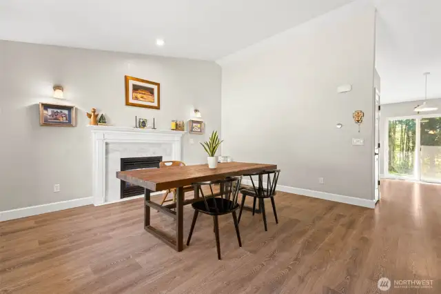 Versatile front room can be used for formal dining or formal living.
