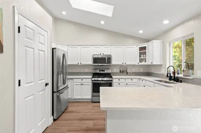 Light, bright, and white kitchen.