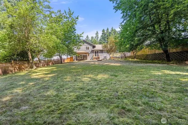 All level backyard with so many possibilities!
