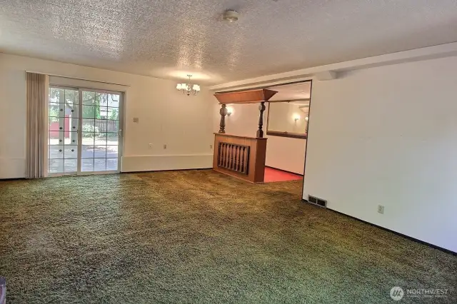 Recreation room with slider door to the backyard