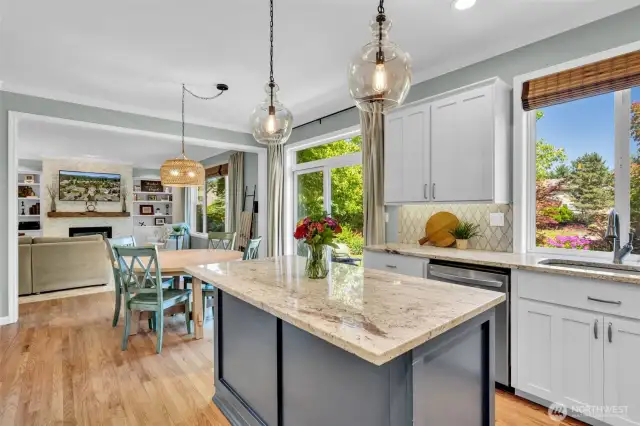 Dimmable lights glow over the gleaming counters adding ambiance.