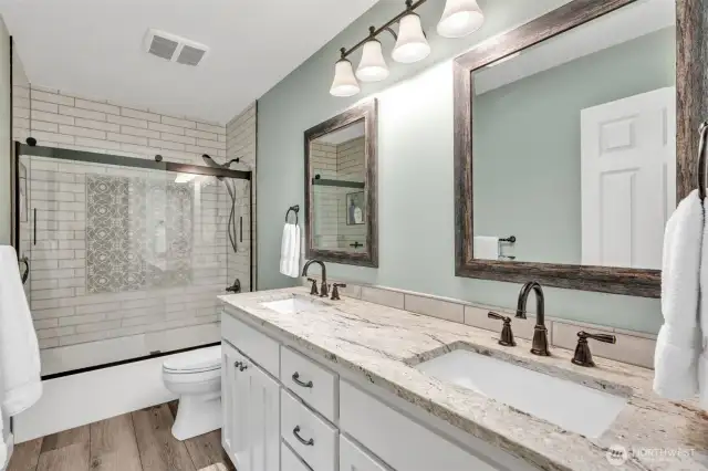 Updated guest bath with double vanity.