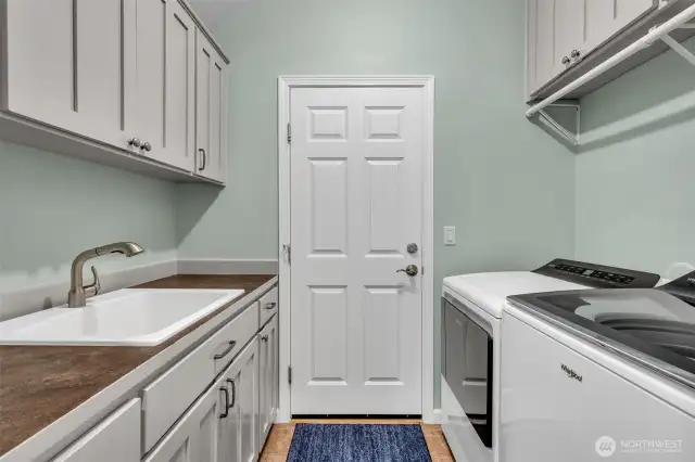 Laundry with storage & sink.  New Washer/Dryer too!