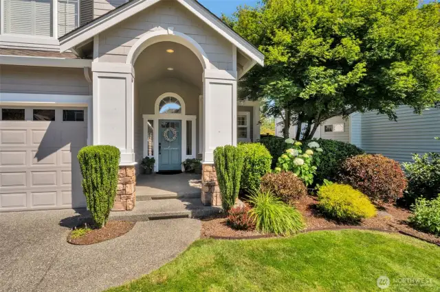 Large entry patio offers sunset views & more entertaining space.