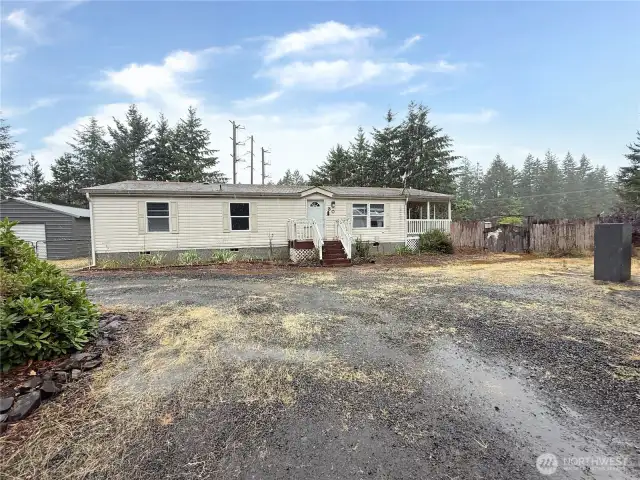 Front view - Back & side yards all fenced. Circle Driveway