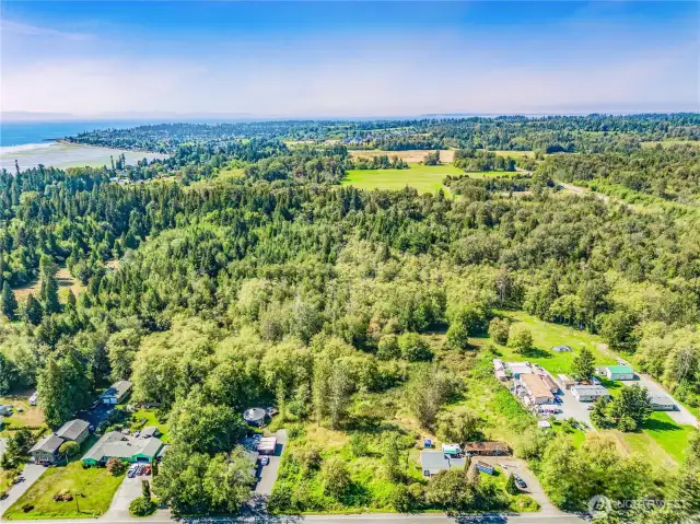 Ample dry land i.e. building sites at western portion of property suspected for possible subdivision with being in UGA and water and sewer in street!