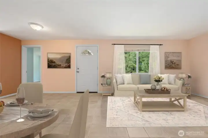 Tile floors in sandstone tones keep this living room durable and easy, and the size makes it functional instead of just filler. Light apricot-butter and amber walls add warmth, while the big picture window makes the room feel even larger. A cadet wall heater gives you custom heat on demand, and the front door’s arched glass detail adds some charm. The best part? The largest bedroom opens right here, so no one has to wander down a hallway to find it.