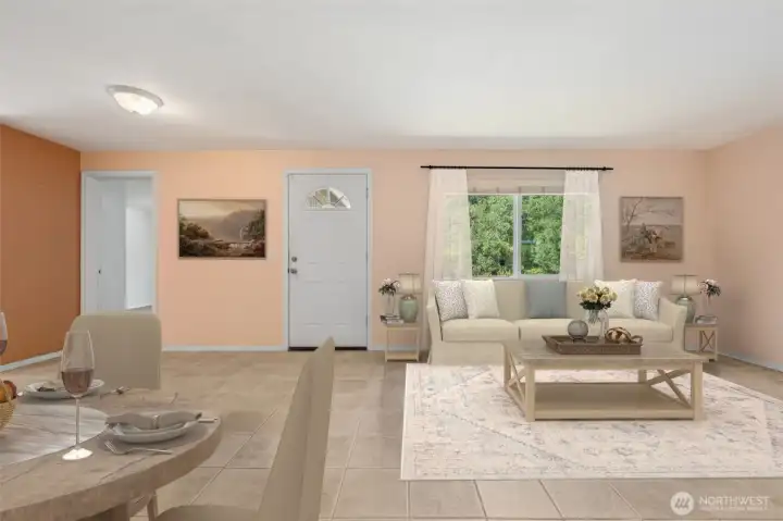 Tile floors in sandstone tones keep this living room durable and easy, and the size makes it functional instead of just filler. Light apricot-butter and amber walls add warmth, while the big picture window makes the room feel even larger. A cadet wall heater gives you custom heat on demand, and the front door’s arched glass detail adds some charm. The best part? The largest bedroom opens right here, so no one has to wander down a hallway to find it.