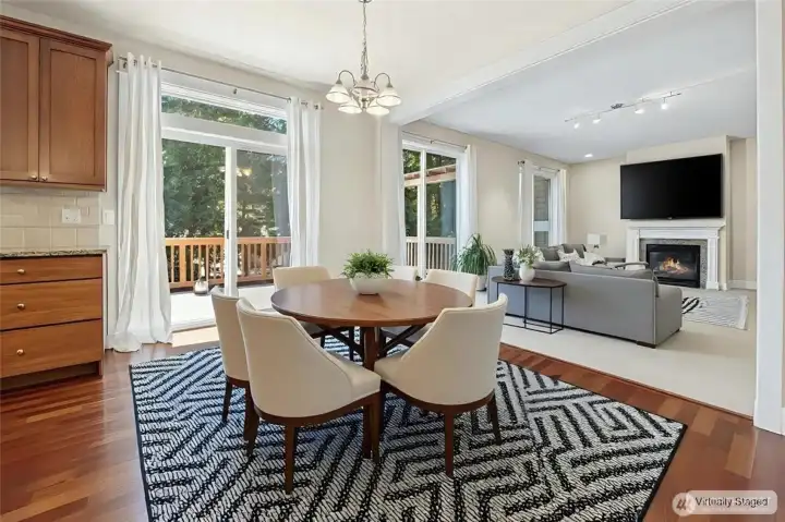 Dining room and family room, sliding doors to main floor deck.